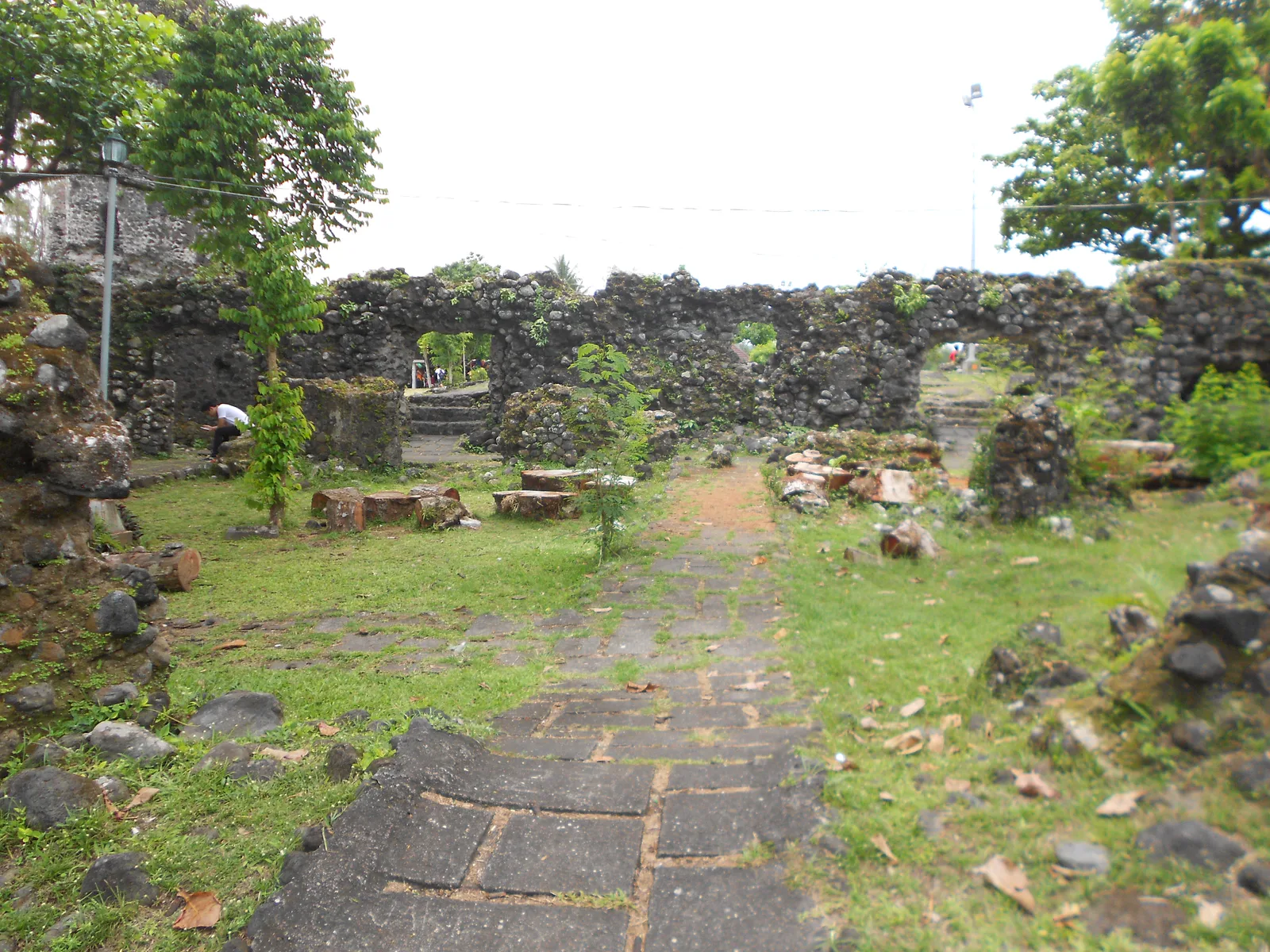 A stone arch and thick masonry in the Cagsawa ruins