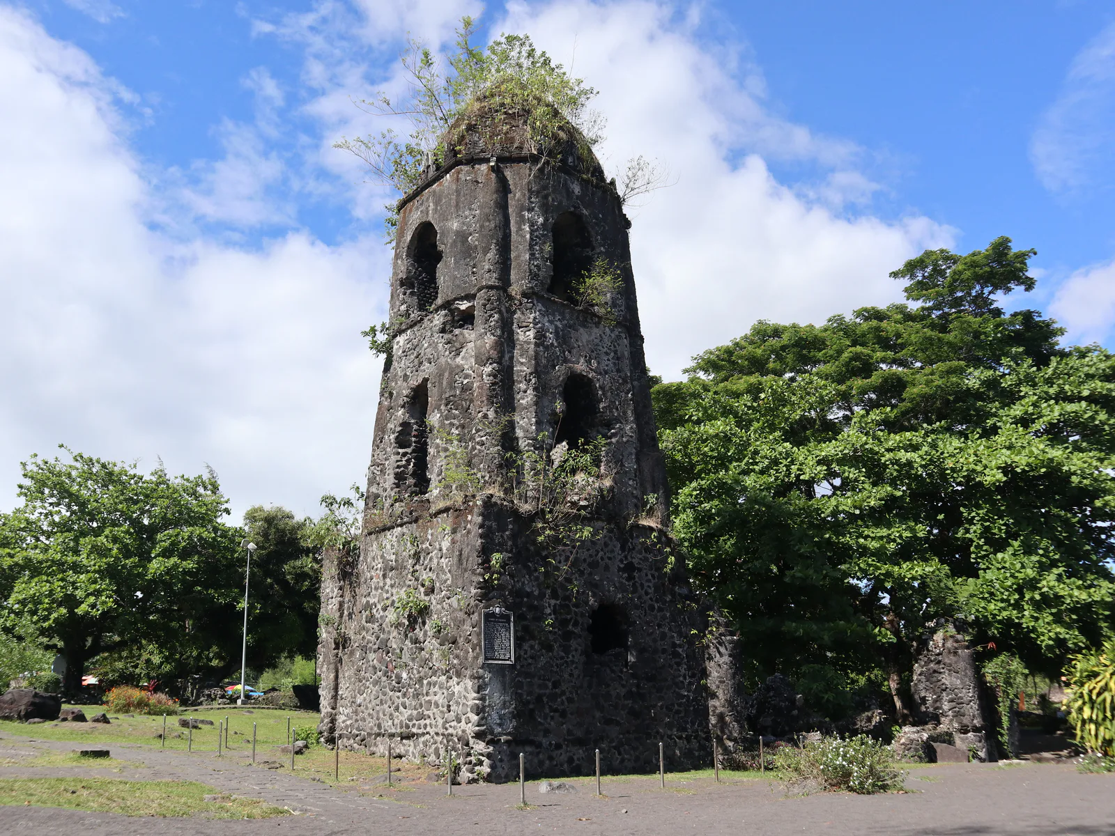 Corner view of the Cagsawa bell tower and its stone buttresses