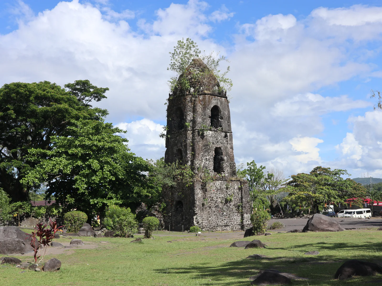 Rear elevation of Cagsawa bell tower under a bright sky